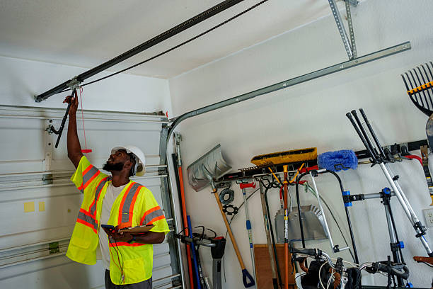 Professional Garage Door Panel Replacement technician working in Centerfield, UT